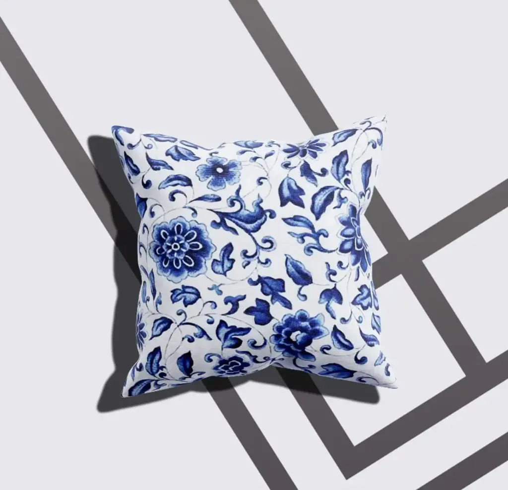 A cushion cover with a white-blue floral design