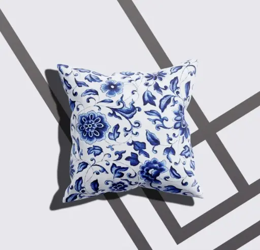 A cushion cover with a white-blue floral design
